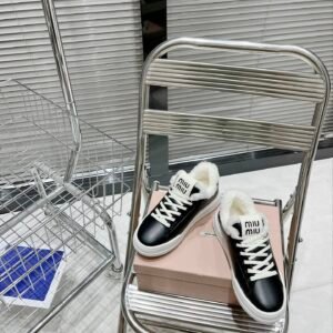 Miu Miu thick soled high top shoes