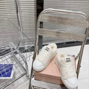 Miu Miu thick soled high top shoes