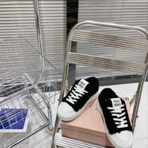 Miu Miu thick soled high top shoes